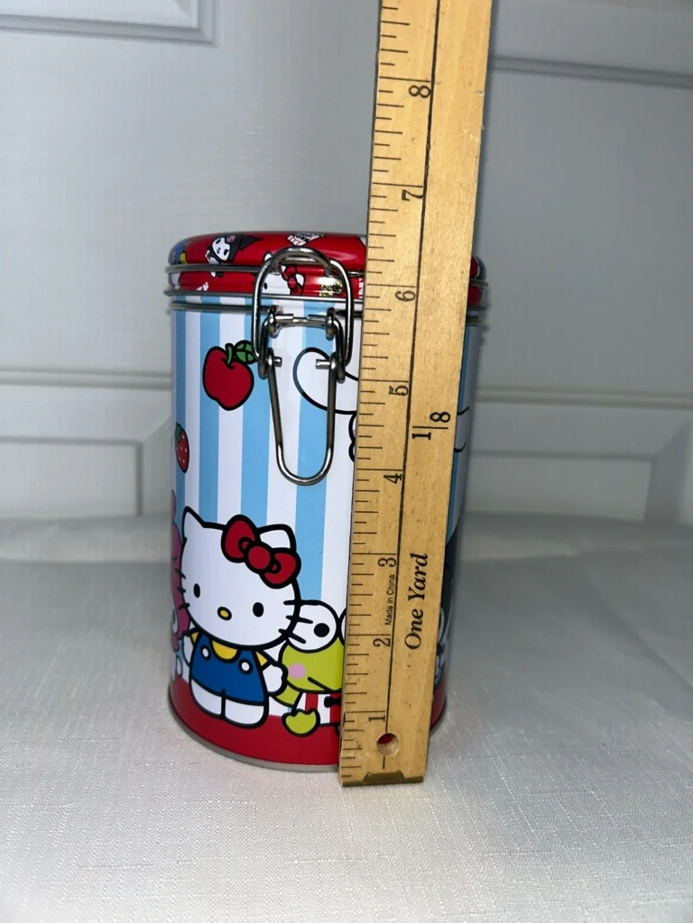 Hello Kitty & Friends Red Blue & White Striped Character Round Storage Tin